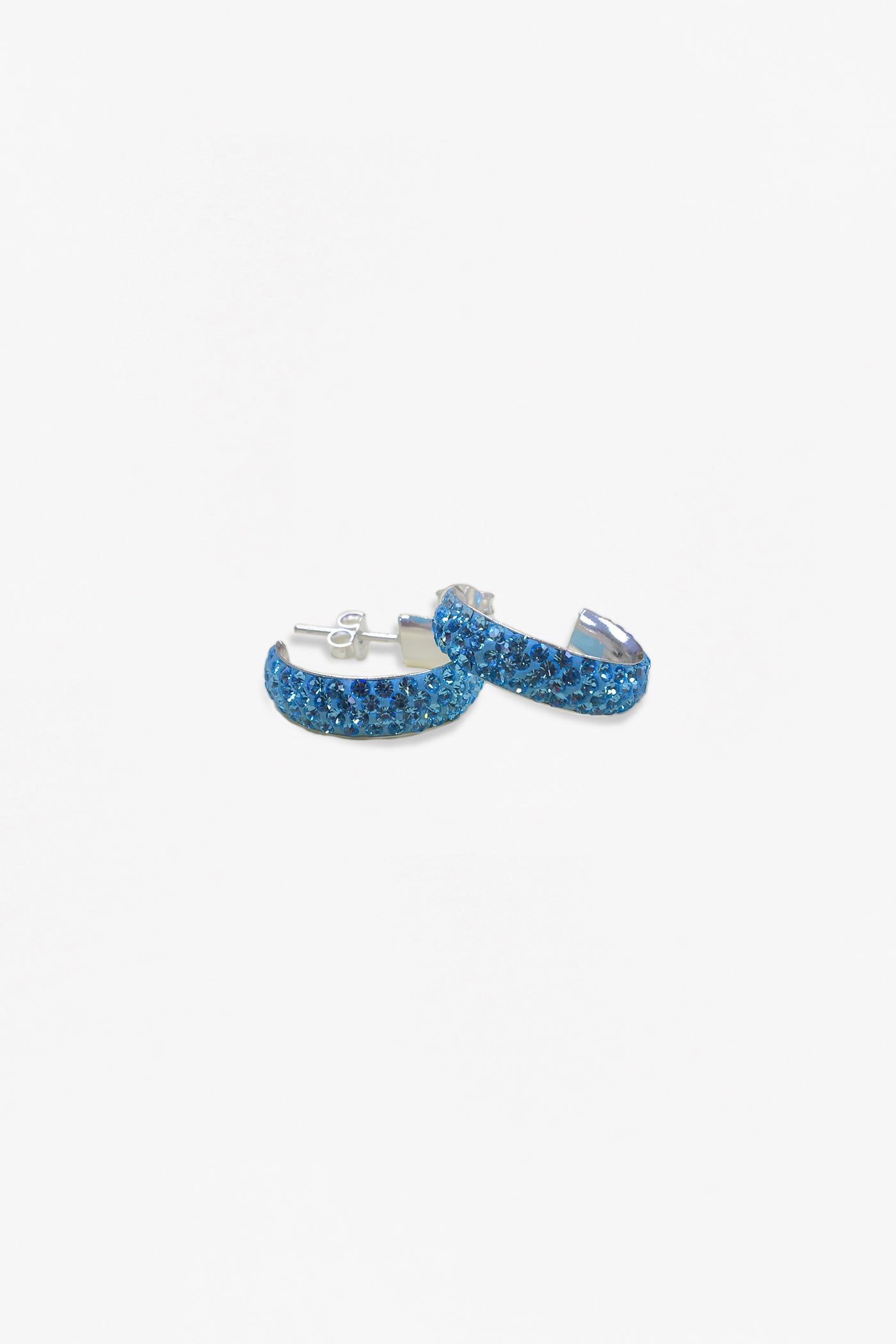 3/4" Swarovski Crystal Huggie Hoop Silver Earrings in Aquamarine | Annie and Sisters