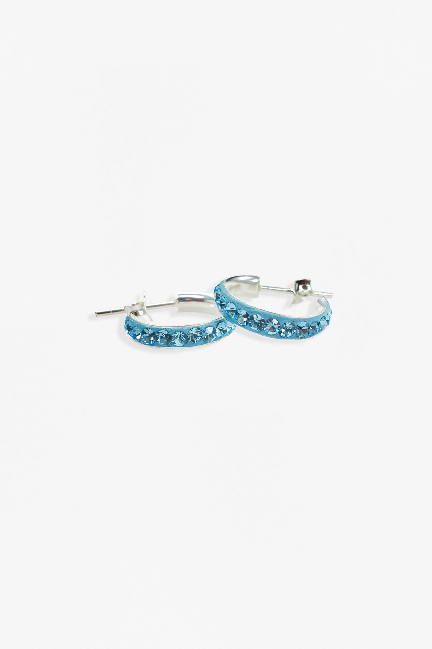 1/2" Swarovski Crystal Hoop Huggie Silver Earrings in Aquamarine | Annie and Sisters