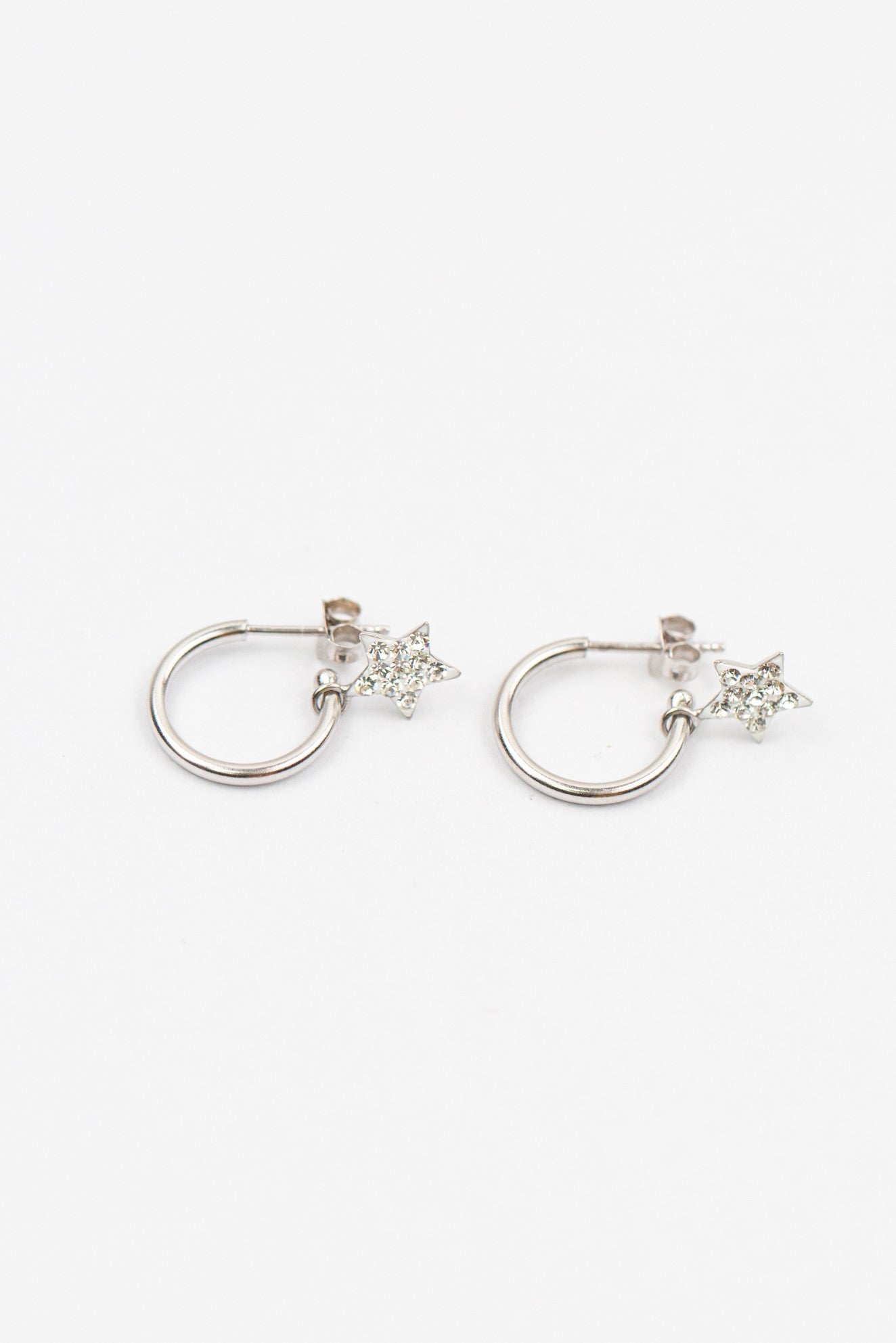 Silver Huggie Earrings with Crystal Star Charm in Clear | Annie and Sisters