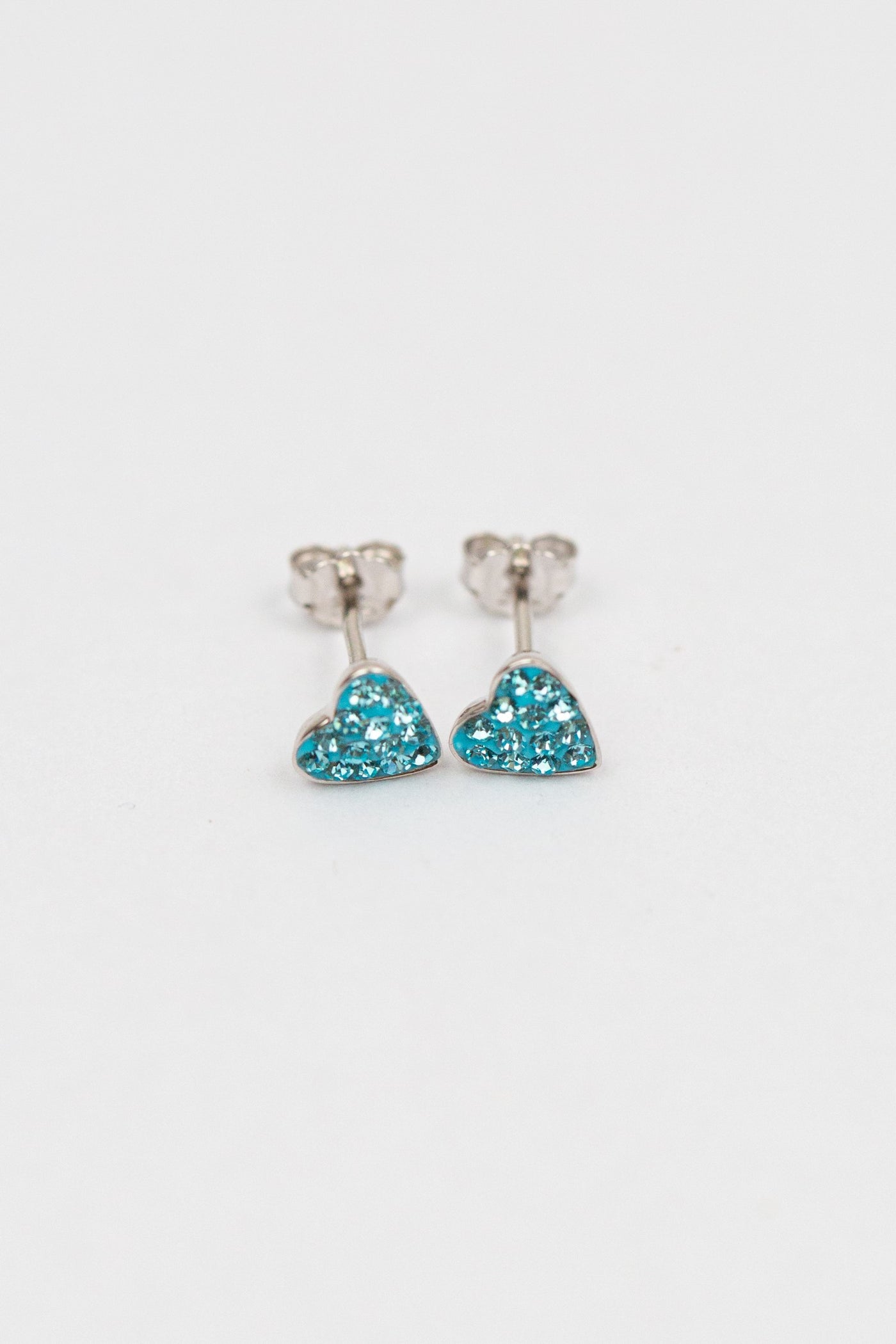 Teeny Tiny Heart Crystal Silver Stud Earrings in Aquamarine | Annie and Sisters 