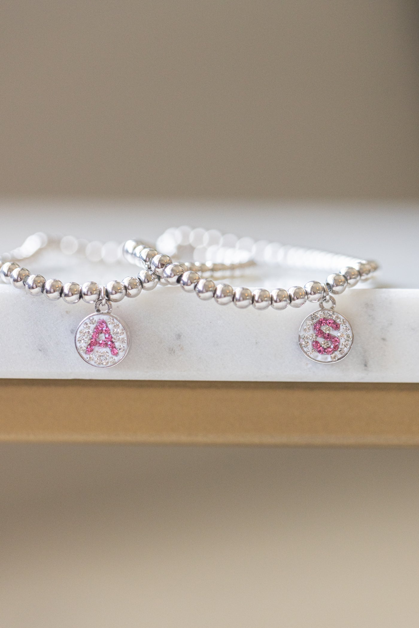 Initial Round Charm on Sterling Silver Beaded Stretch Bracelet