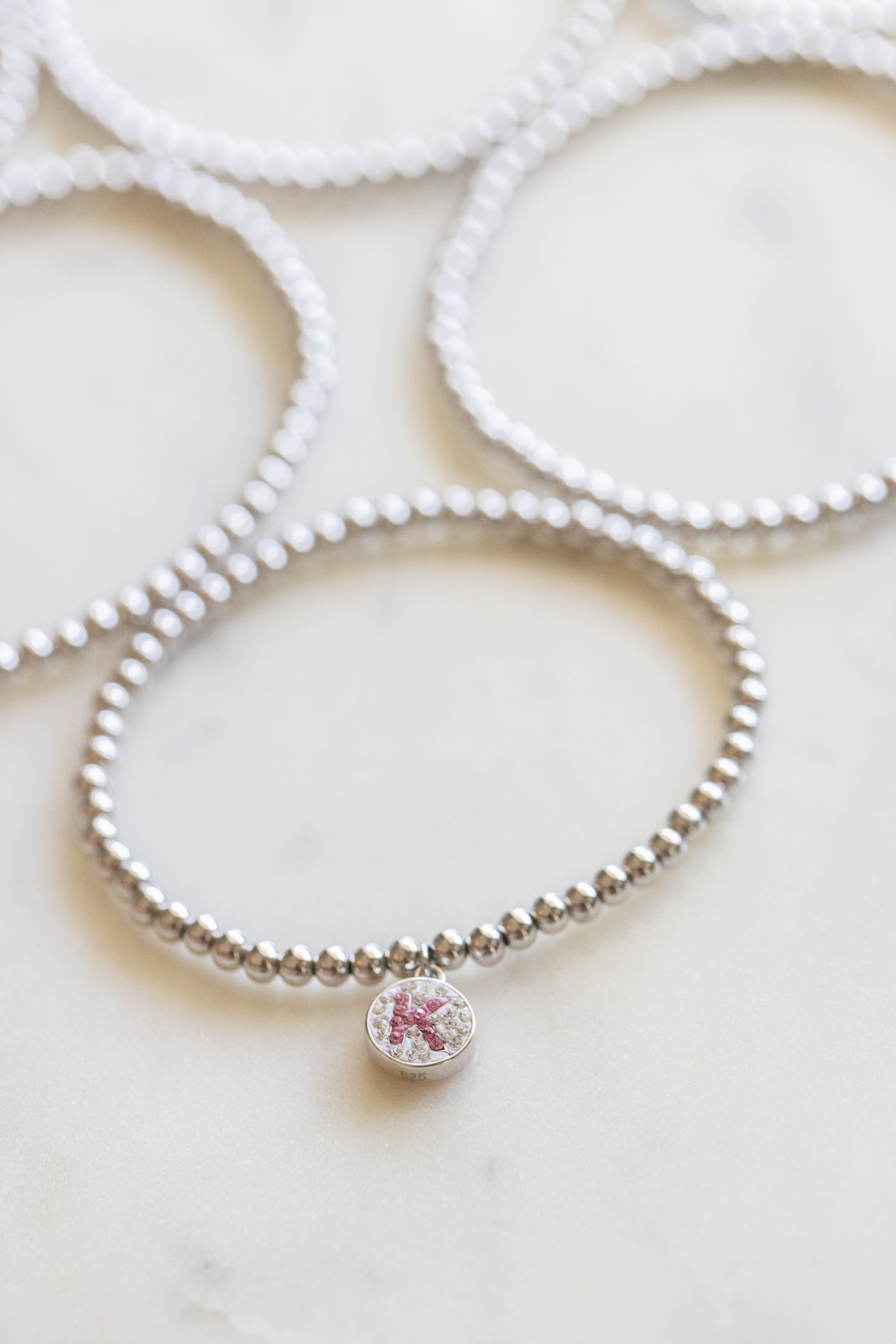 Initial Round Charm on Sterling Silver Beaded Stretch Bracelet