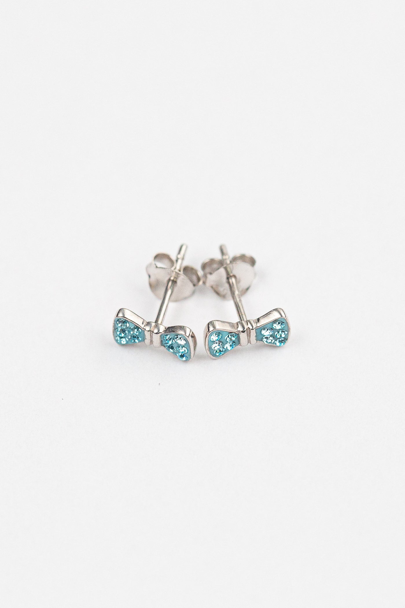 Bow Crystal Silver Stud Earrings in Light Turquoise | Annie and Sisters | sister stud earrings, for kids, children's jewelry, kid's jewelry, best friend